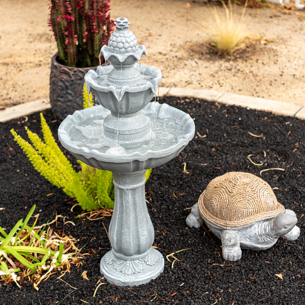 Slate Cascade — 36" Grey Solar Water Fountain, styled in a garden patio setting