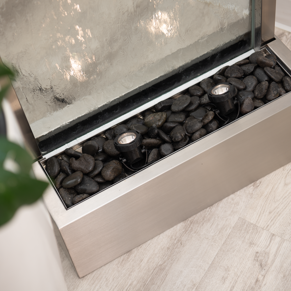 Crystal Cascade — 72" Steel Glass Fountain, placed in an outdoor backyard setting