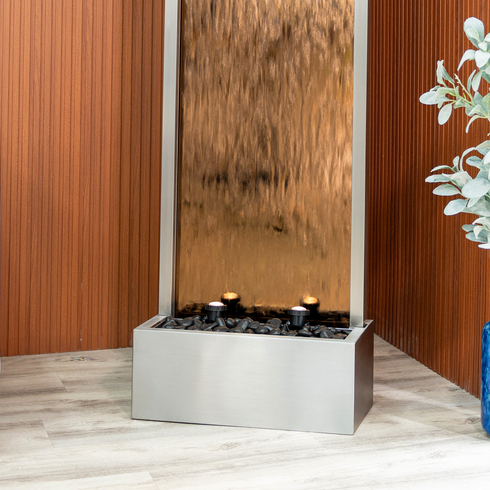 Mirror Horizon — 68" Stainless Steel Mirror Fountain, styled with surrounding plants