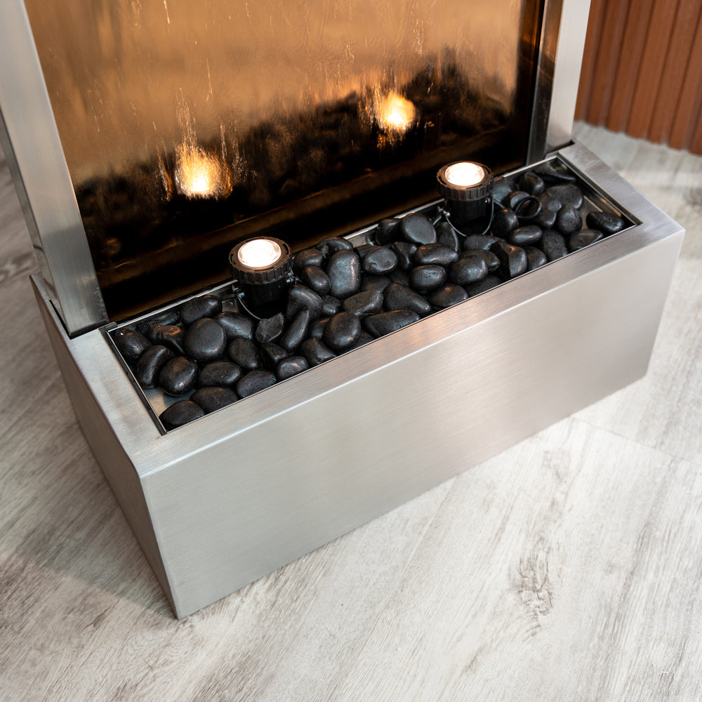 Mirror Horizon — 68" Stainless Steel Mirror Fountain, displayed near outdoor seating