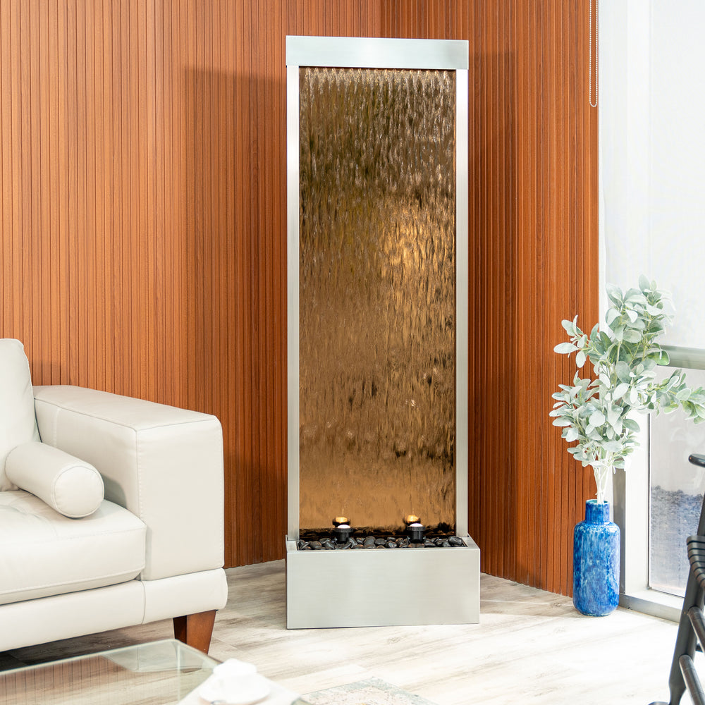 Mirror Horizon — 68" Stainless Steel Mirror Fountain, shown on a stone patio
