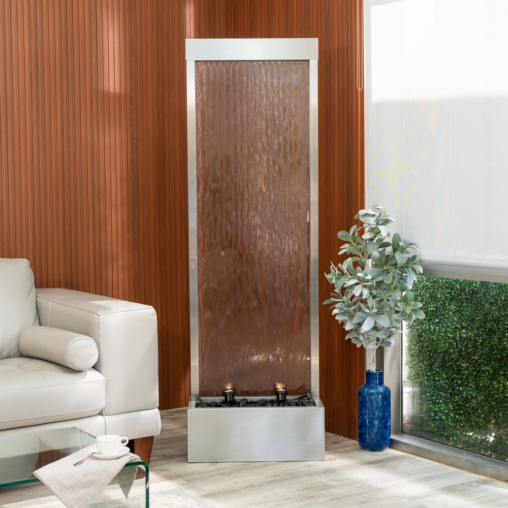 Mirror Horizon — 68" Stainless Steel Mirror Fountain, styled in a garden patio setting